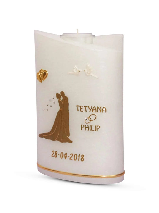 Hochzeitskerze Brautpaar in Gold auf einer Perlmutt Kerze - WikaKerzen